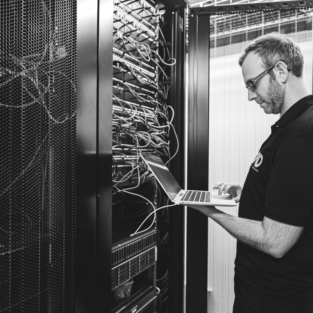 Dean Oxnard in the server room at Net-Defence