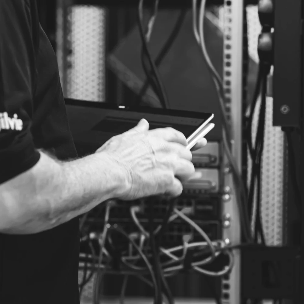 Net-Defence team member in a server room.