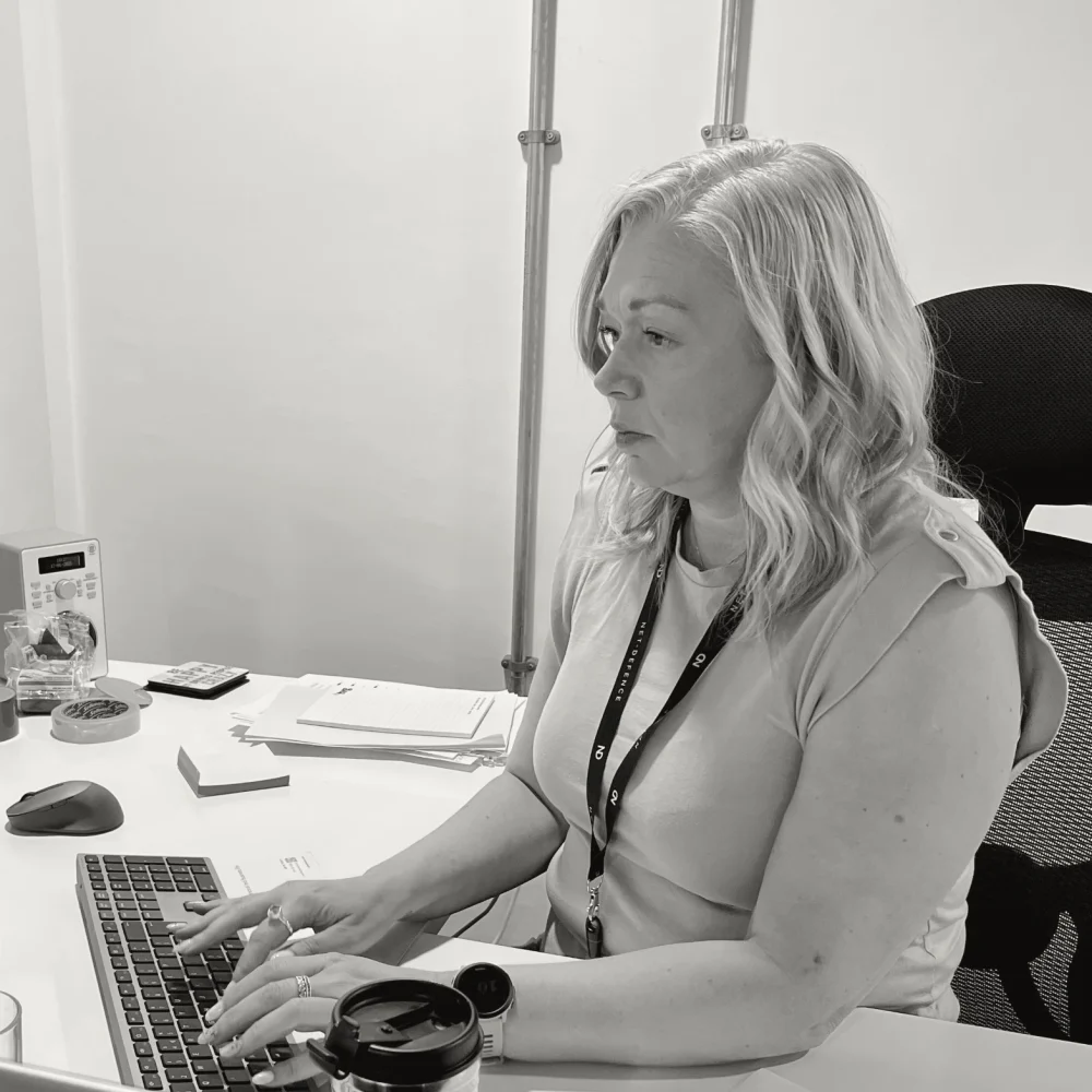 Debra from Net-Defence at her desk.