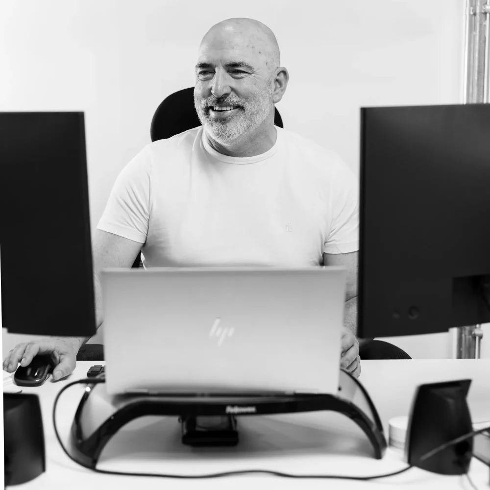 Craig Hamilton working on his desktops
